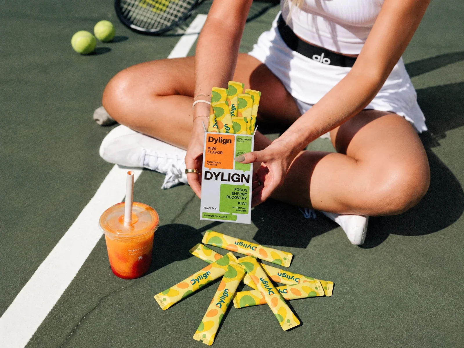 Orange stick pack held outdoors