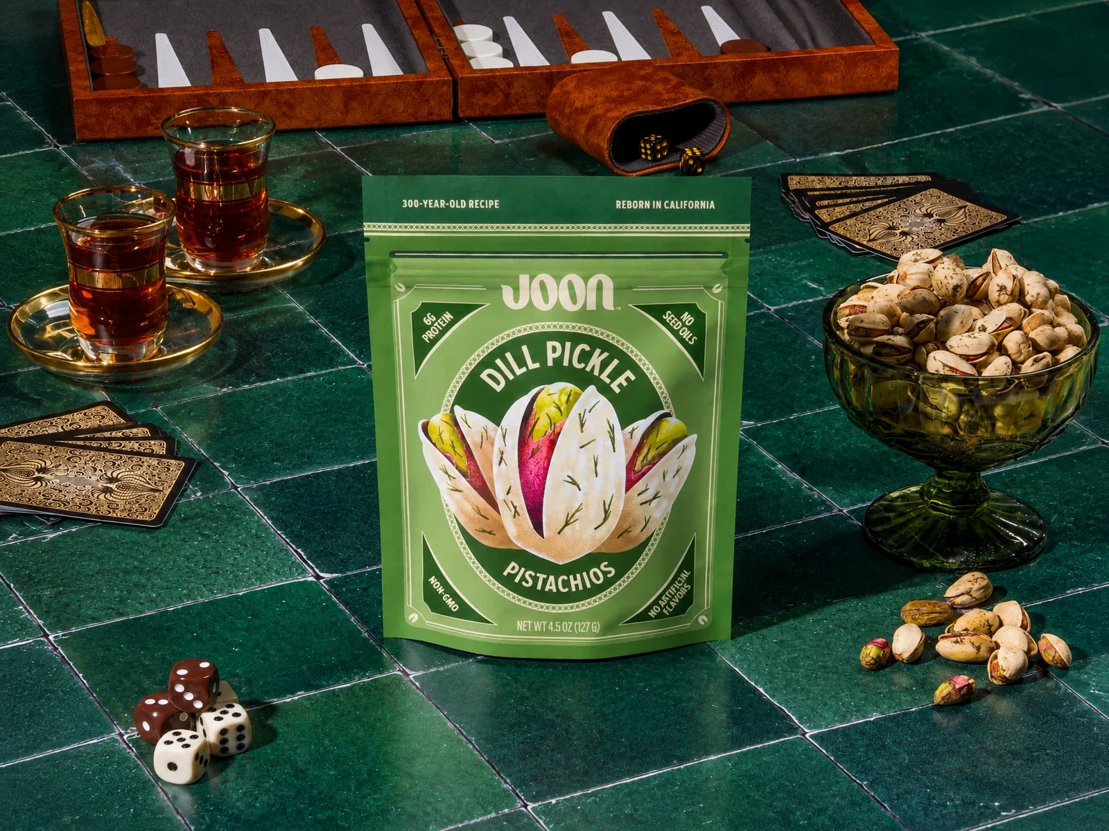 Green snack pouches at a table