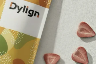 Dylign flexible pouch packaging close-up with strawberry candy pieces