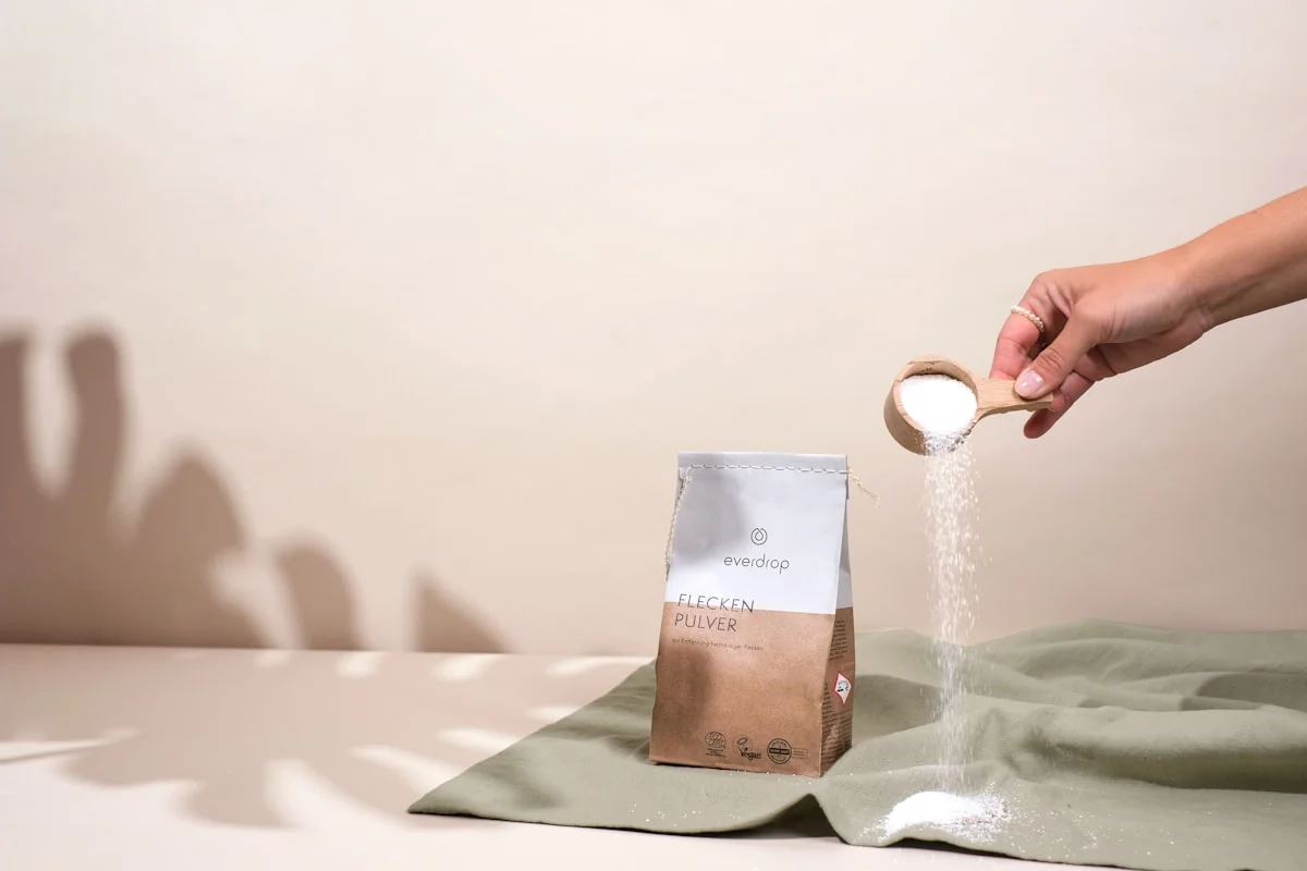 coffee being poured into a flat bottom pouch for fill testing