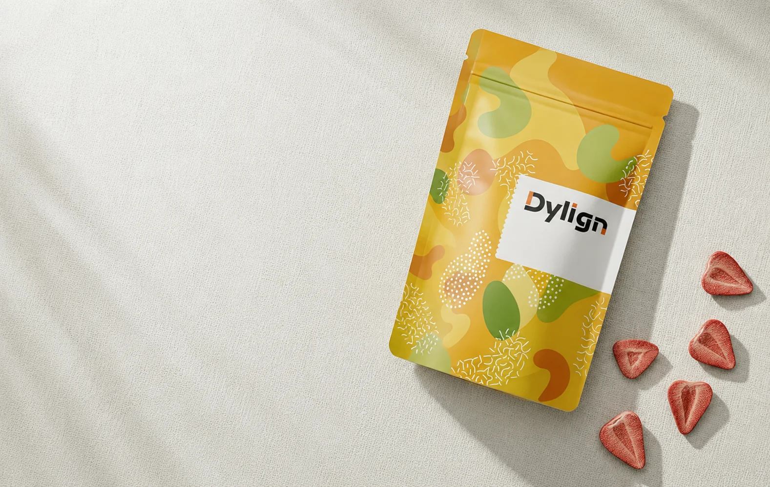 Dylign pouch with small red candies on a light surface