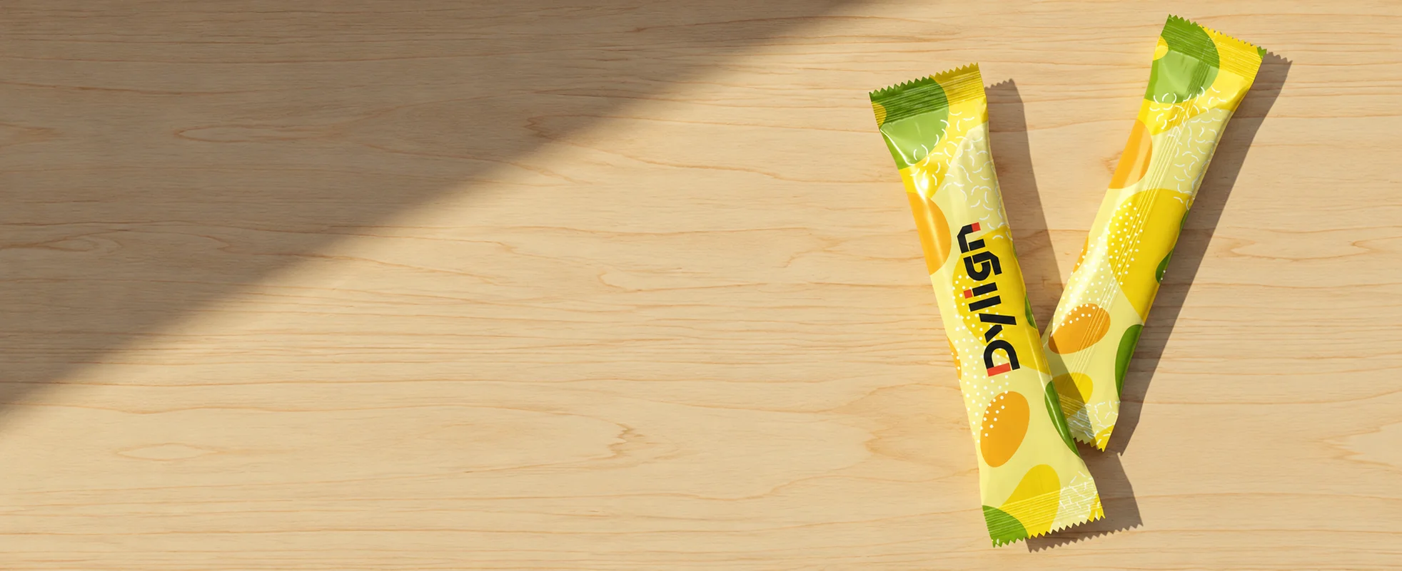 Dylign packaged stick products on a wooden table