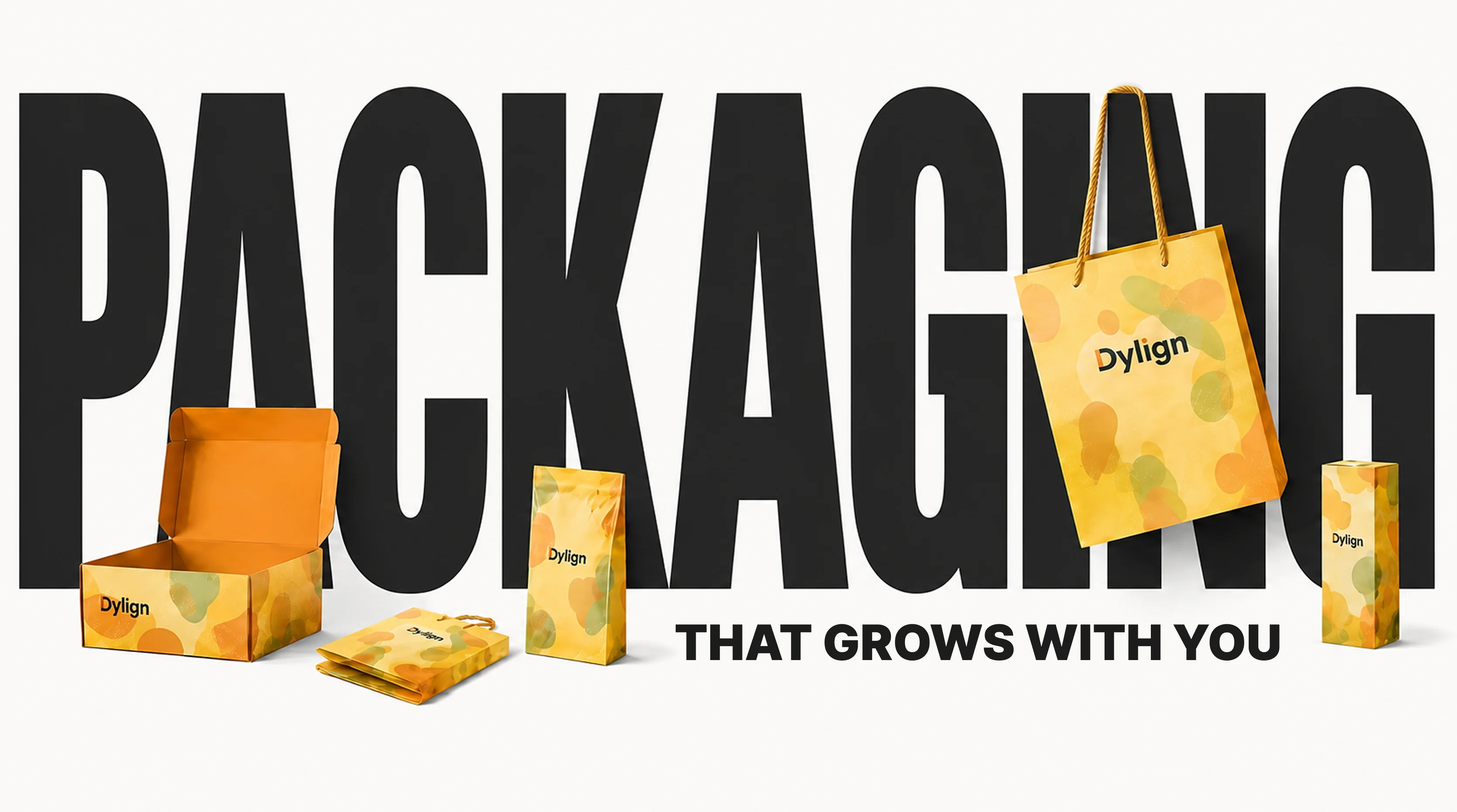 Dylign packaging formats arranged in front of large packaging lettering