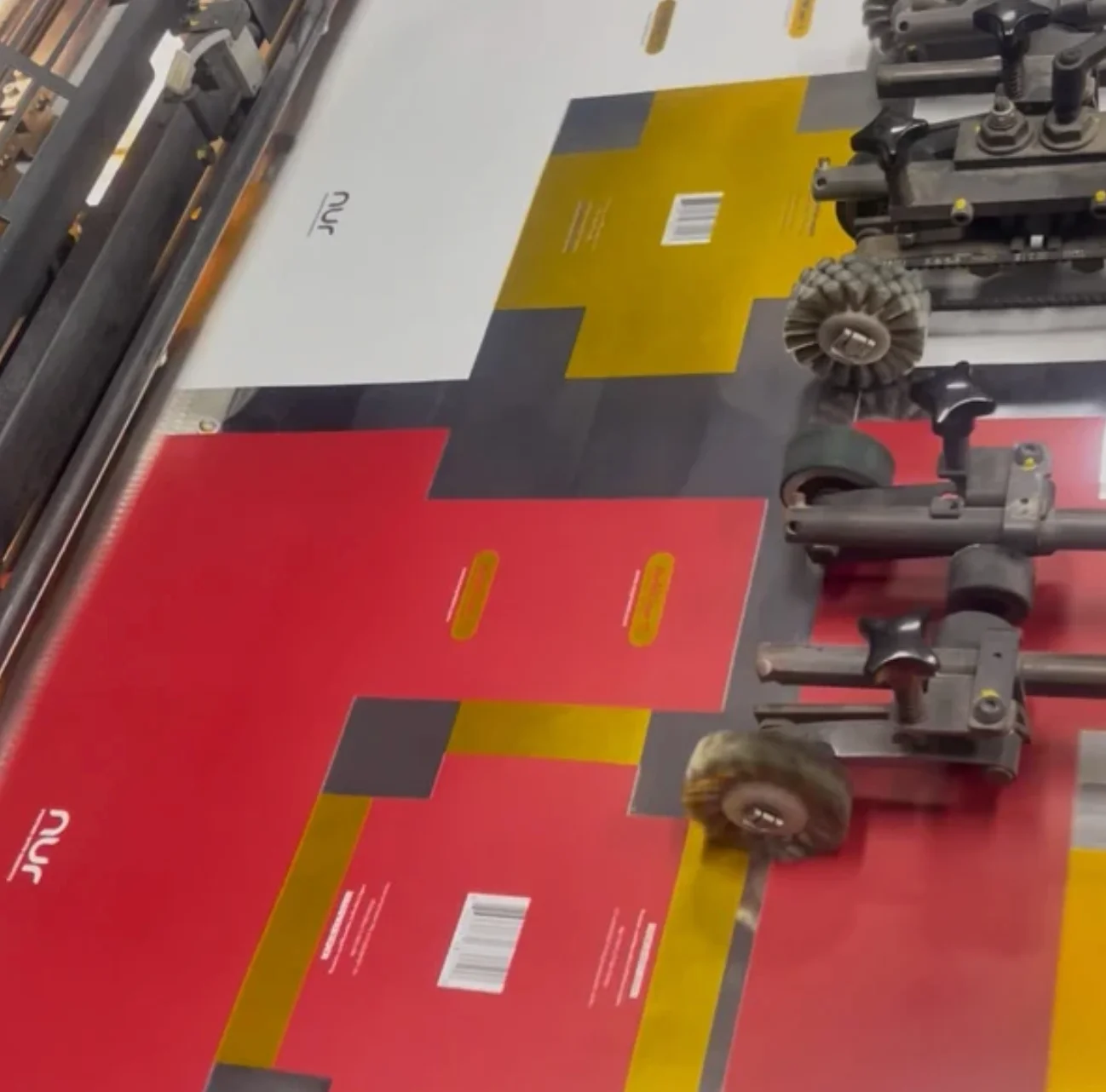 NUR gradient-gold packaging during print production