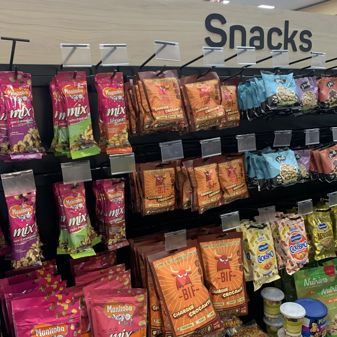 The founders' earlier BIF-brand snack pouches displayed on a retail snack shelf.