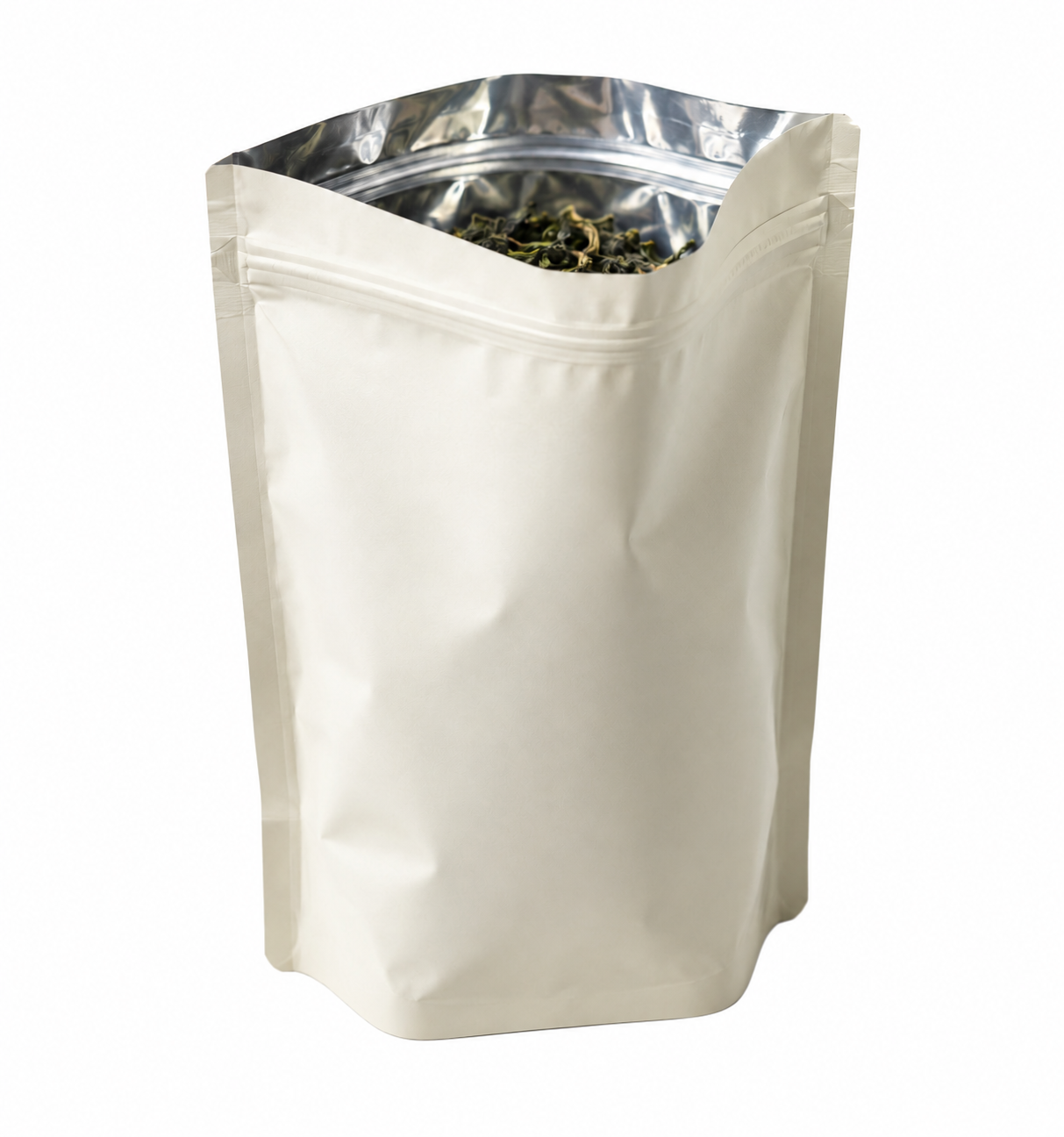 Open ivory stand-up tea pouch showing a foil-lined interior and zipper