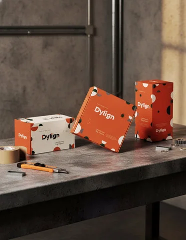 Custom Dylign folding cartons displayed with packaging design tools